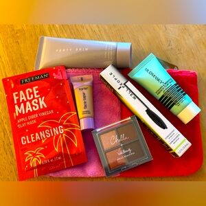 Brand new makeup bag with great travel size and some full size items.